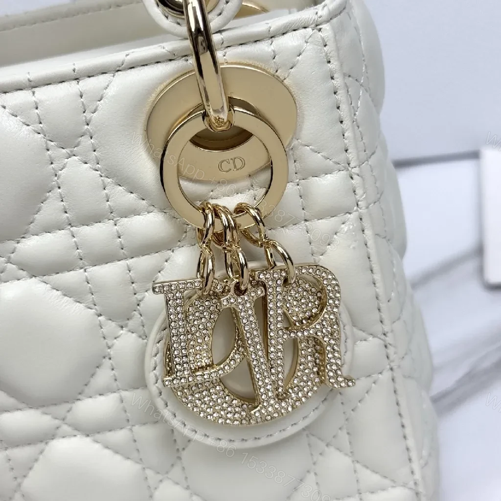 View 8 of Ivory Quilted Mini Handbag with Chain and Charms - Luxury Style