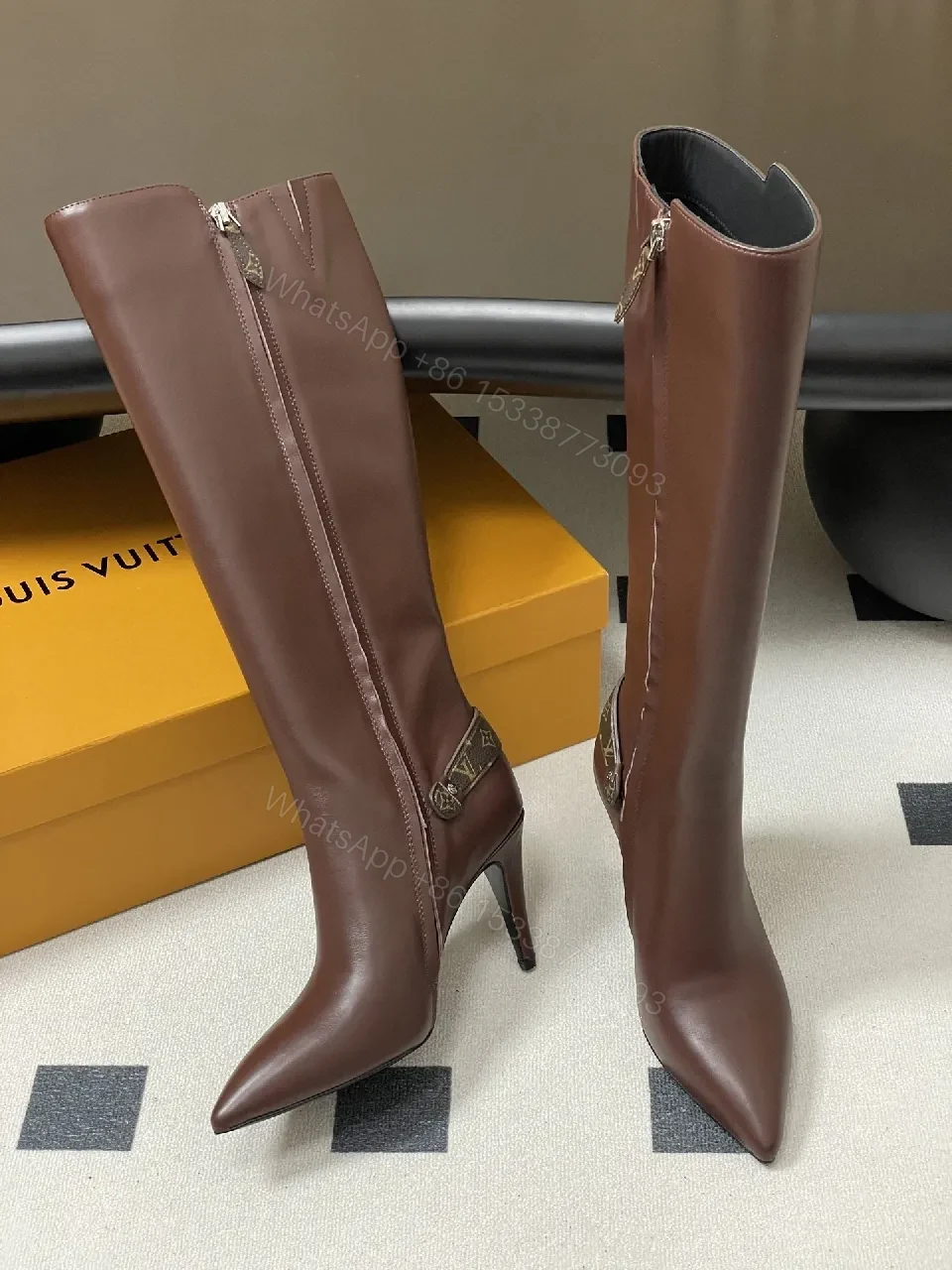 View 7 of Brown Leather Knee-High Boots with LV-Accent Details