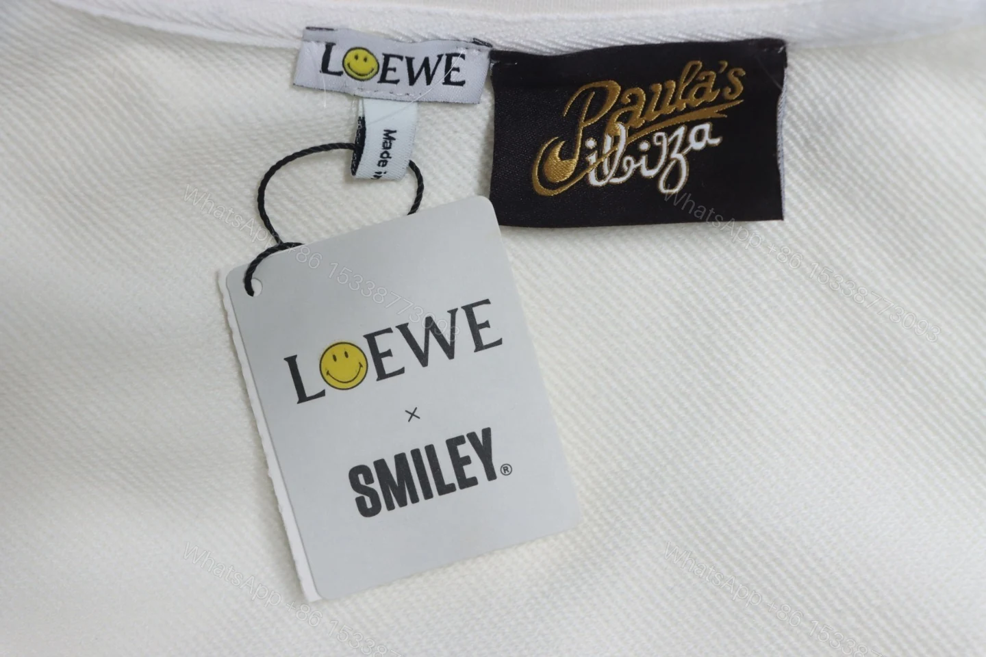 View 5 of Loewe Hollowed-out Smiling Round-neck Hoodie White
