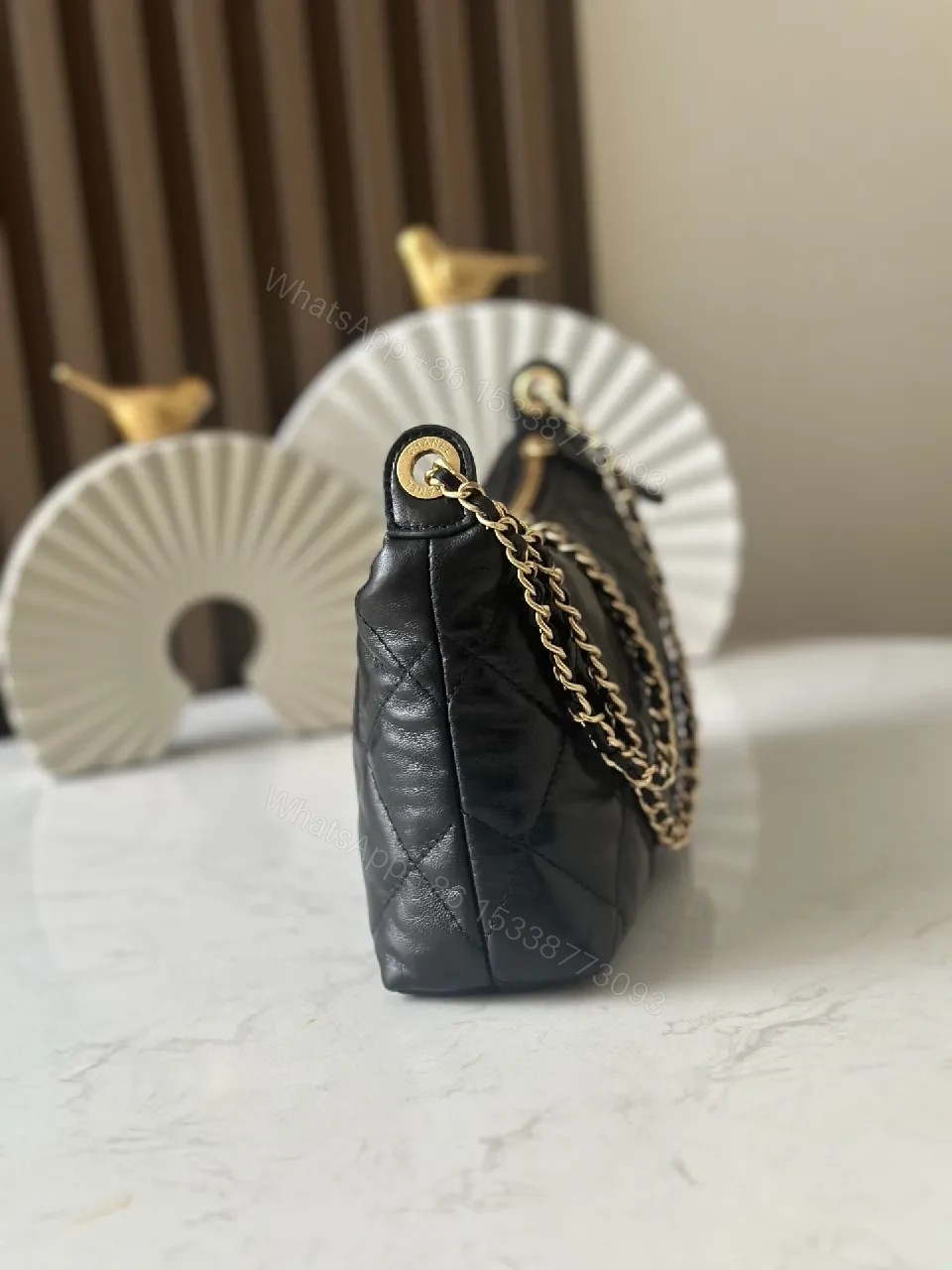 View 7 of Quilted Black Leather Shoulder Bag — Timeless Luxury, Day-to-Night