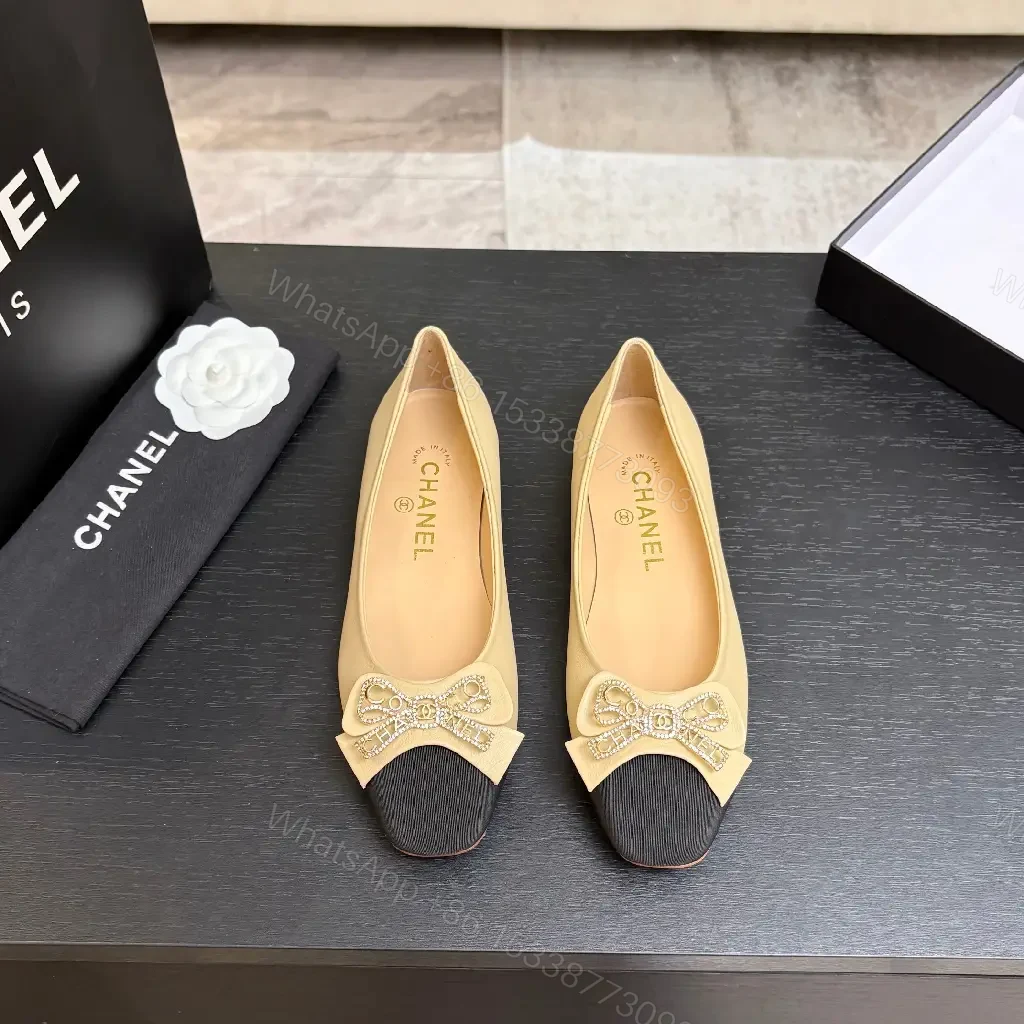 View 6 of Beige Leather Flats with Black-Toe Cap & Crystal Bow