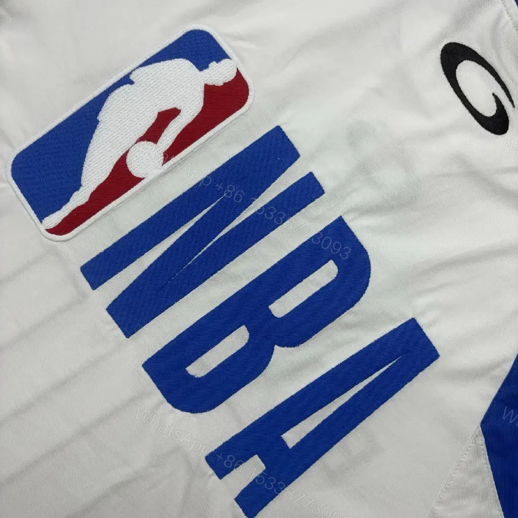 View 10 of Bold Black-White Statement Jersey Tee with Electric Blue Accents