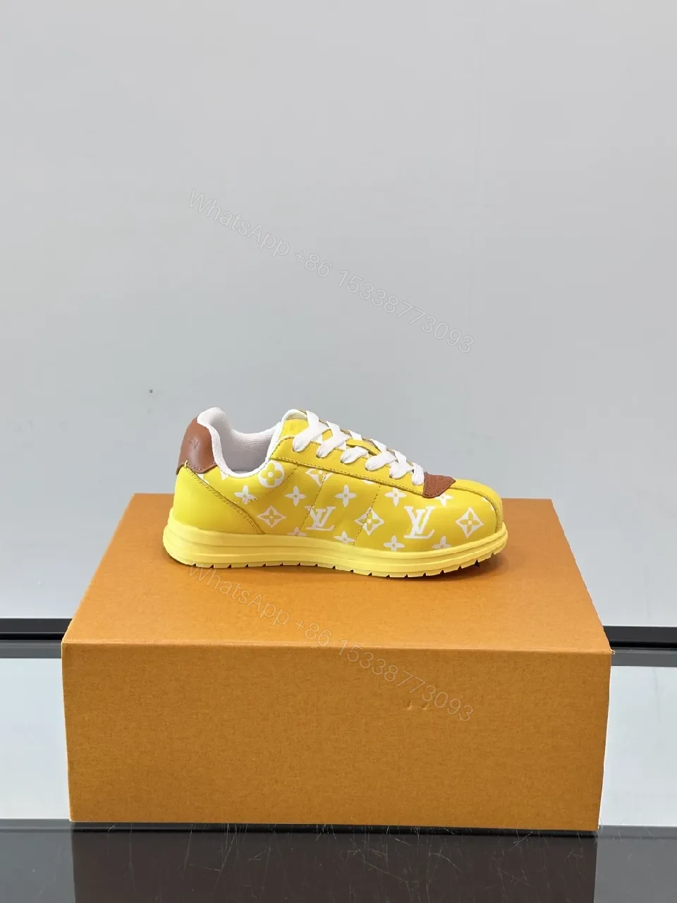 View 5 of Sunny Yellow Monogram Sneaker: Luxe Comfort & Street Style