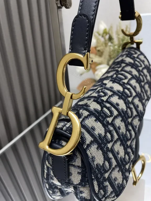 View 3 of Denim-Patterned Bag with Gold Hardware: Structured Luxury