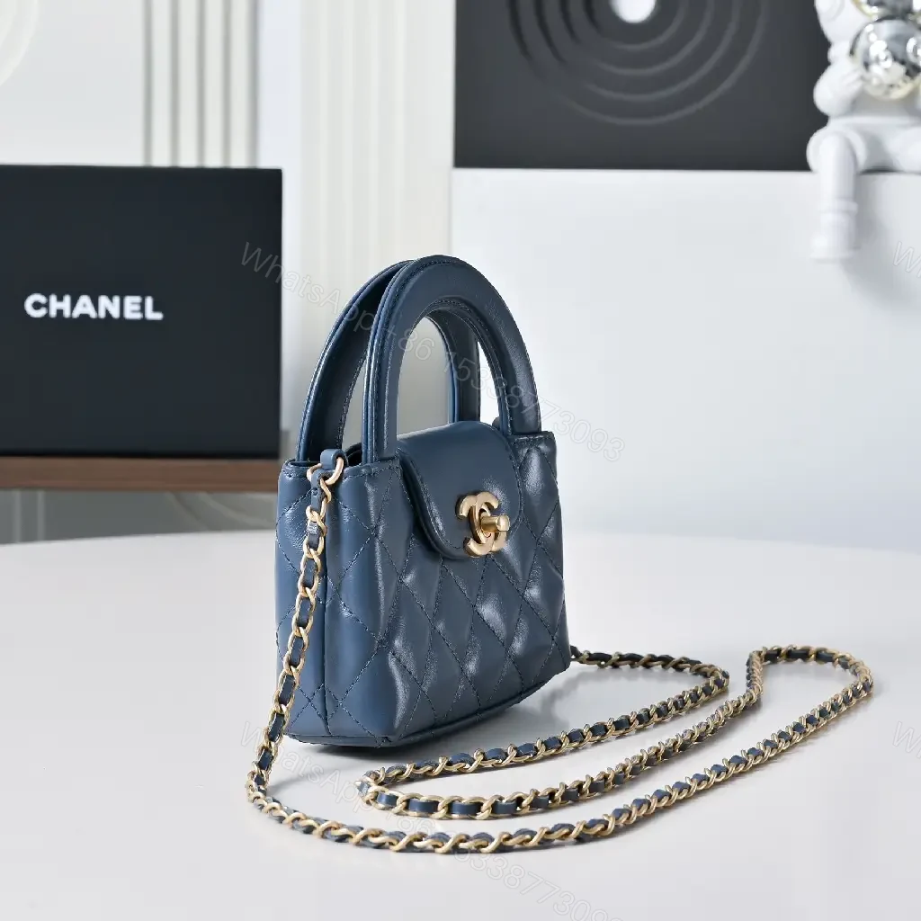 View 9 of Compact Blue Quilted Satchel with Gold Clasp Bag