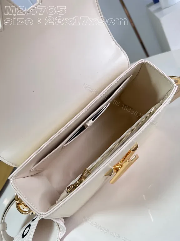View 7 of Elegant Compact Crossbody with Gold LV-Inspired Hardware