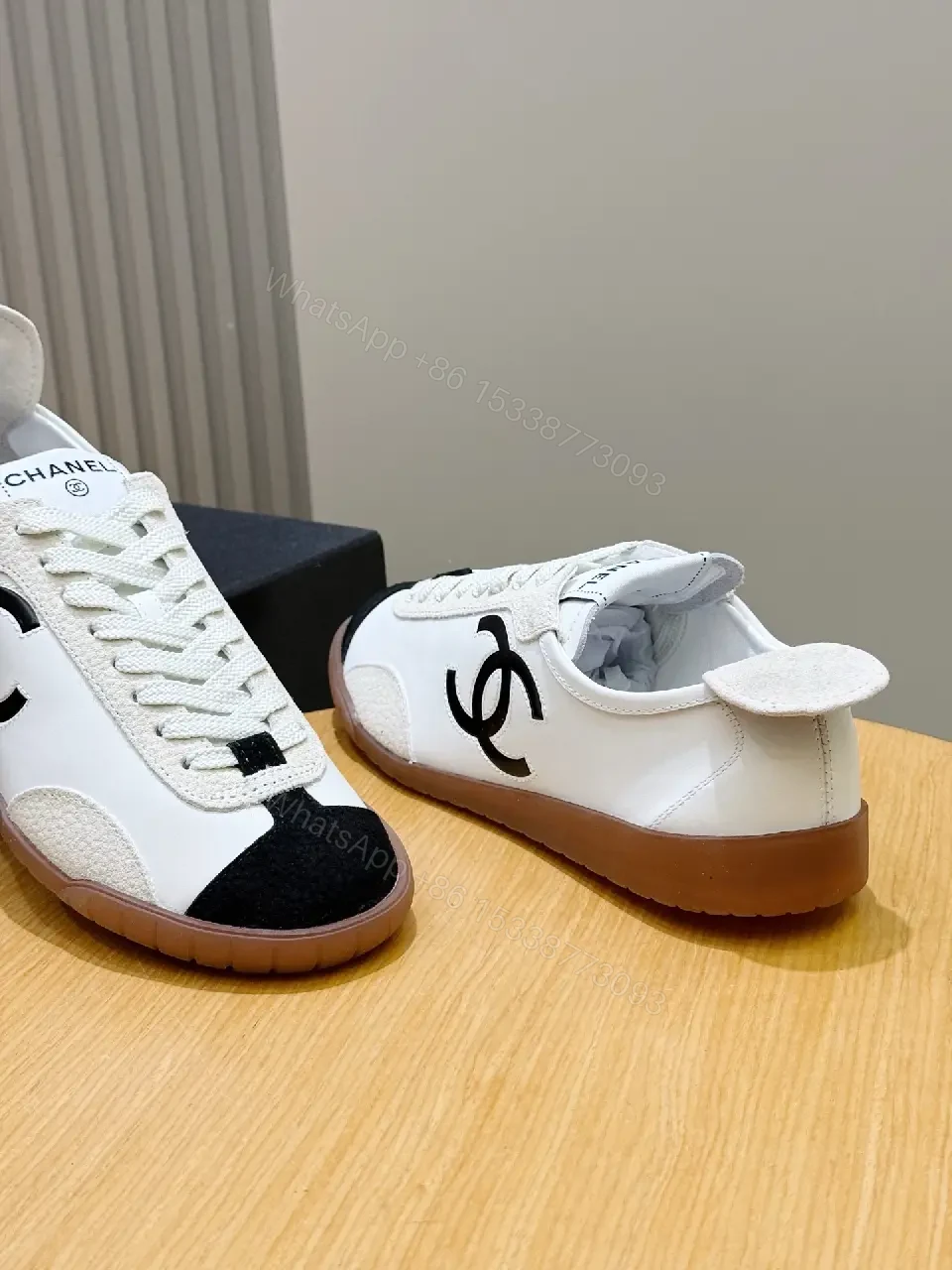 View 3 of White Leather Sneaker Black Toe Classic Chanel Logo Shoes