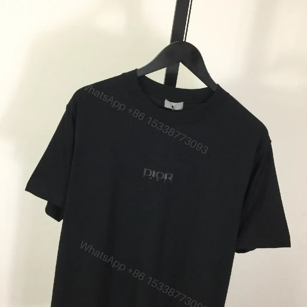 View 8 of Minimalist Black Tee Dress: Subtle Dior Branding, Versatile Style