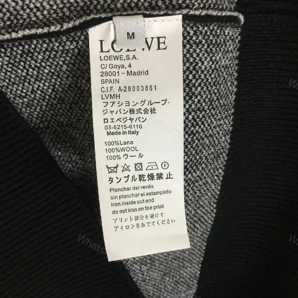 View 2 of Bold Logo Knit with Iconic Graphic Detailing — Modern Sophistication Knit