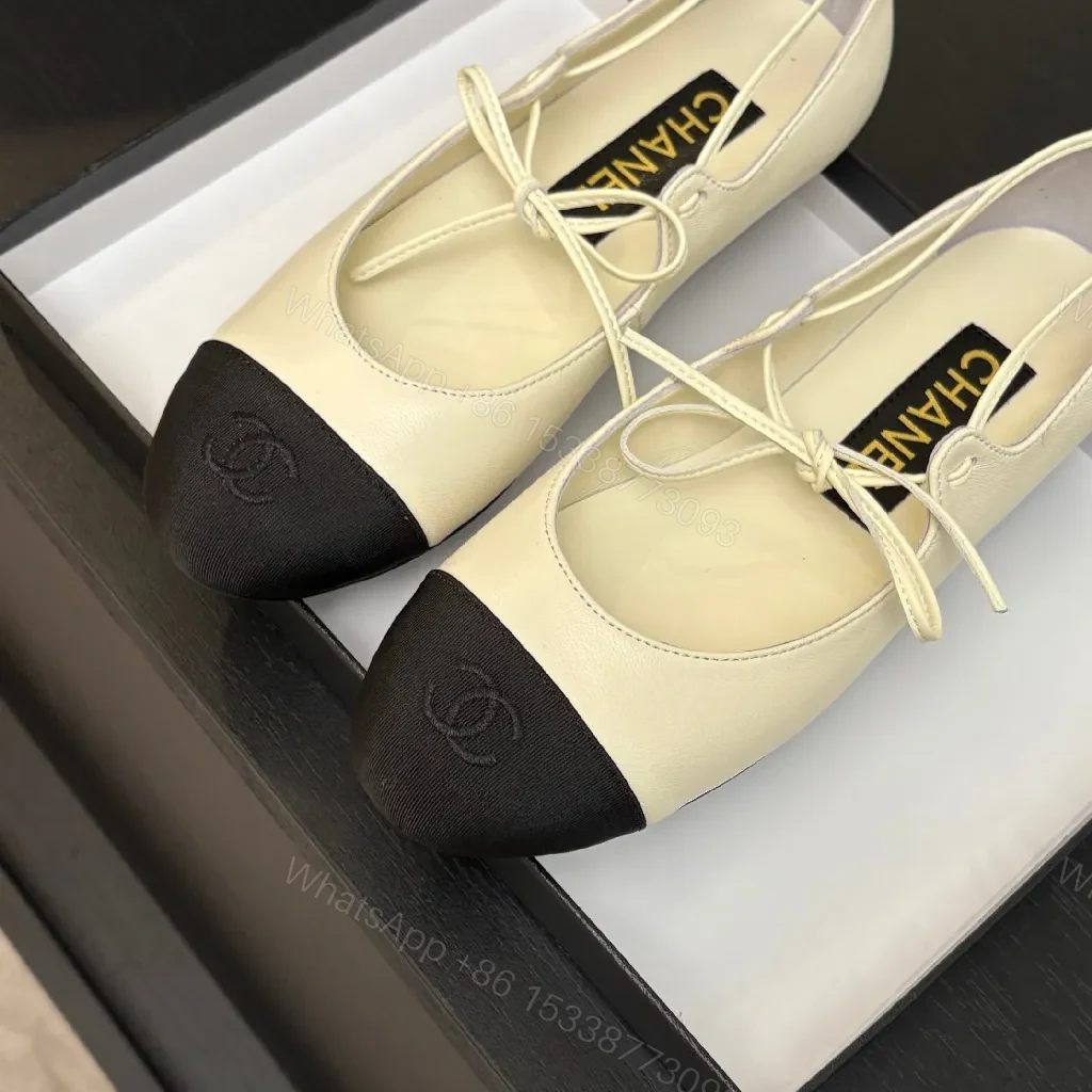 View 9 of Ivory Leather Ballet Flats with Black Cap Toe, Lace-Up, Elegant