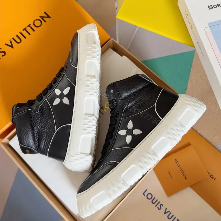 View 2 of Black Leather High-Top Sneakers with LV Detail