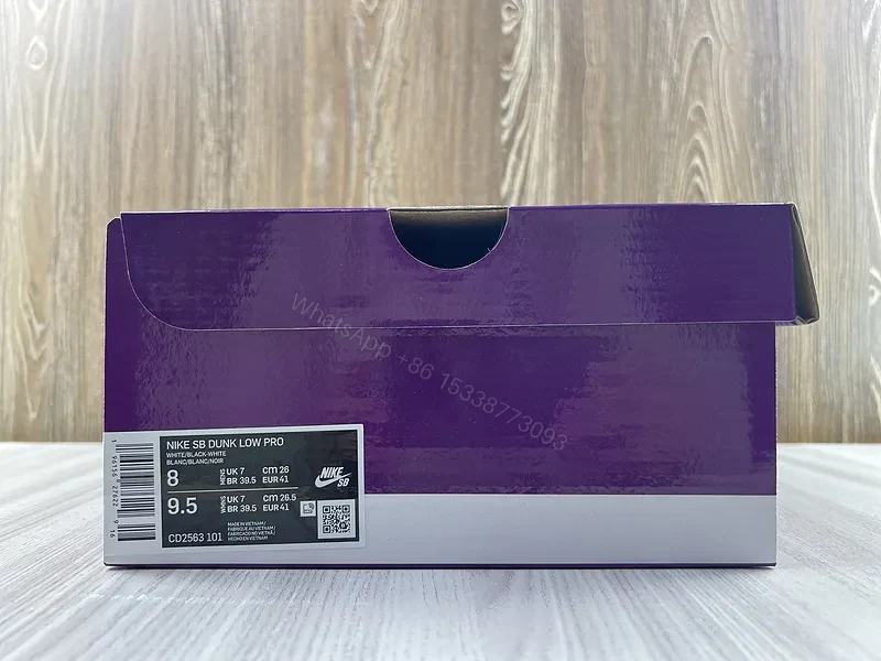View 2 of Minimal White & Black Nike-Style Sneaker with Gum Sole