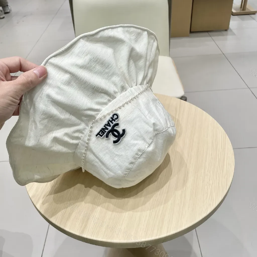 View 3 of Ivory Pearl-Trim Luxe Bucket Hat - Lightweight Style + Comfort