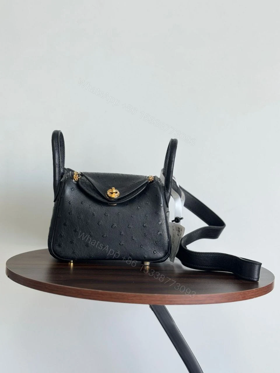 View 8 of HERMÈS Ostrich Mini Lindy shoulder bag in Terre Cuite