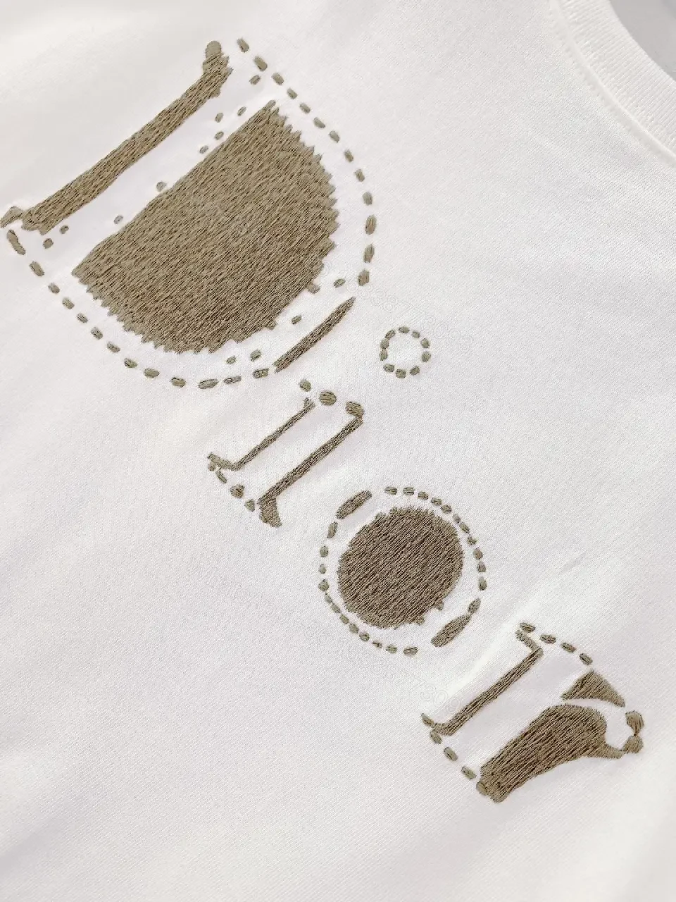 View 7 of White Cotton Tee + Subtle Logo Embellishment + Luxe Casual + Elevated Detail + T-Shirt