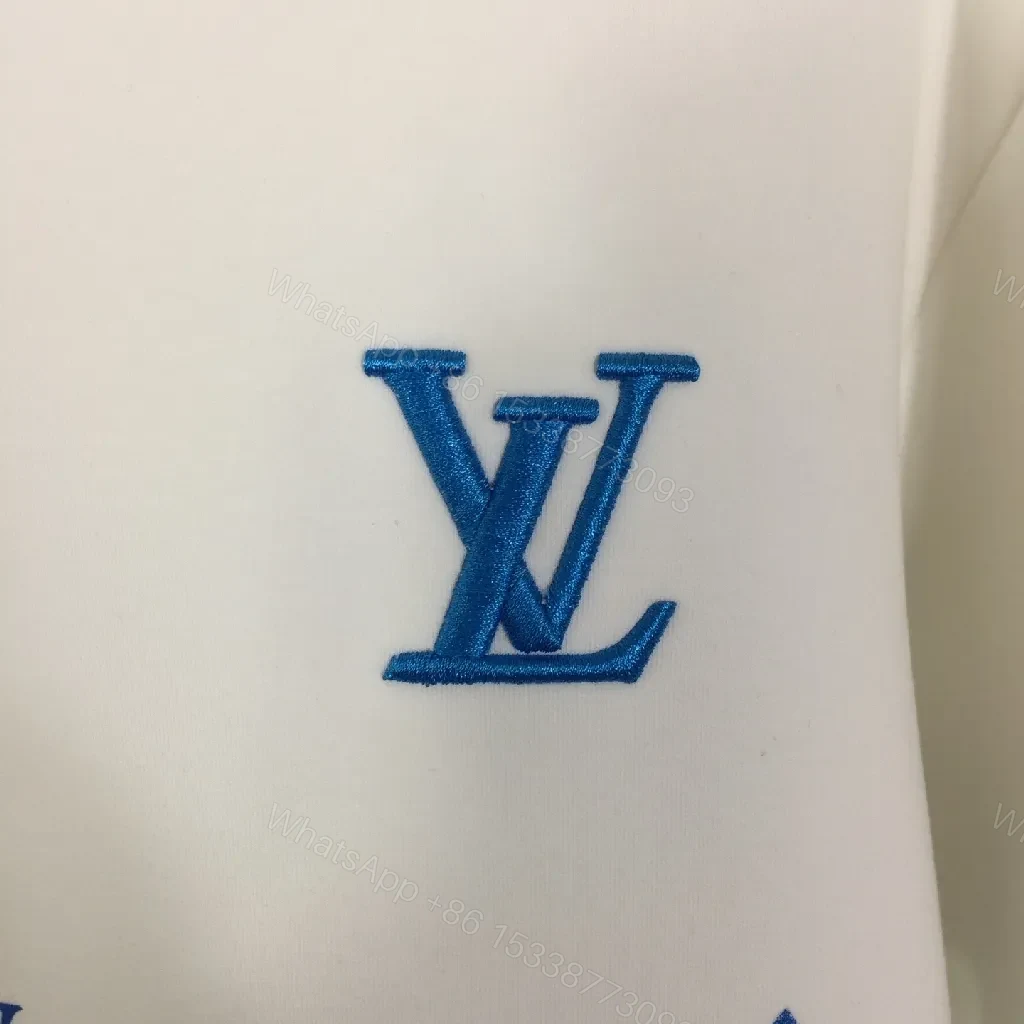 View 3 of White Luxe Sweatshirt with Subtle Blue LV Motifs