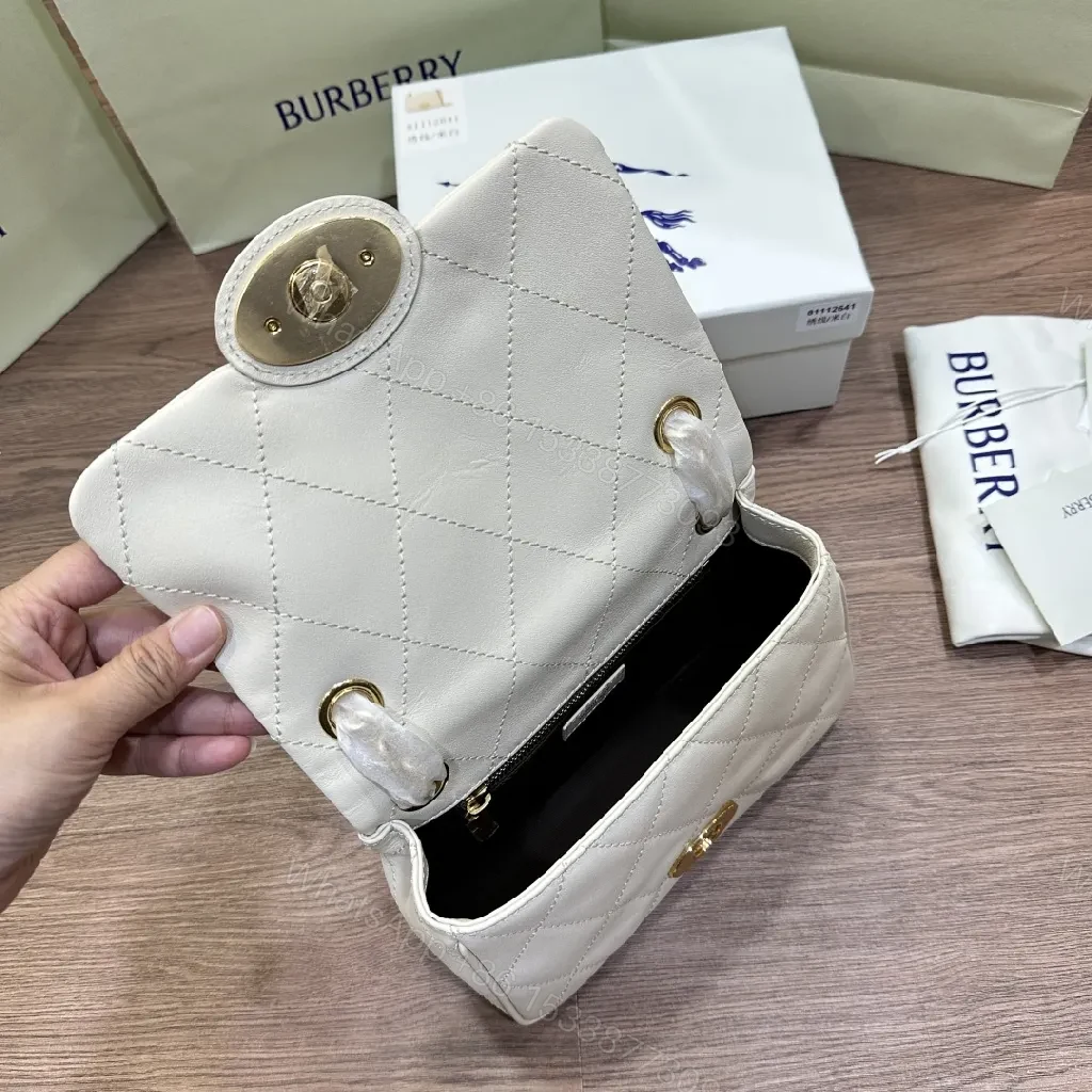 View 7 of Quilted Mini Crossbody: Diamond Stitch, Gold Hardware, Elegant Texture