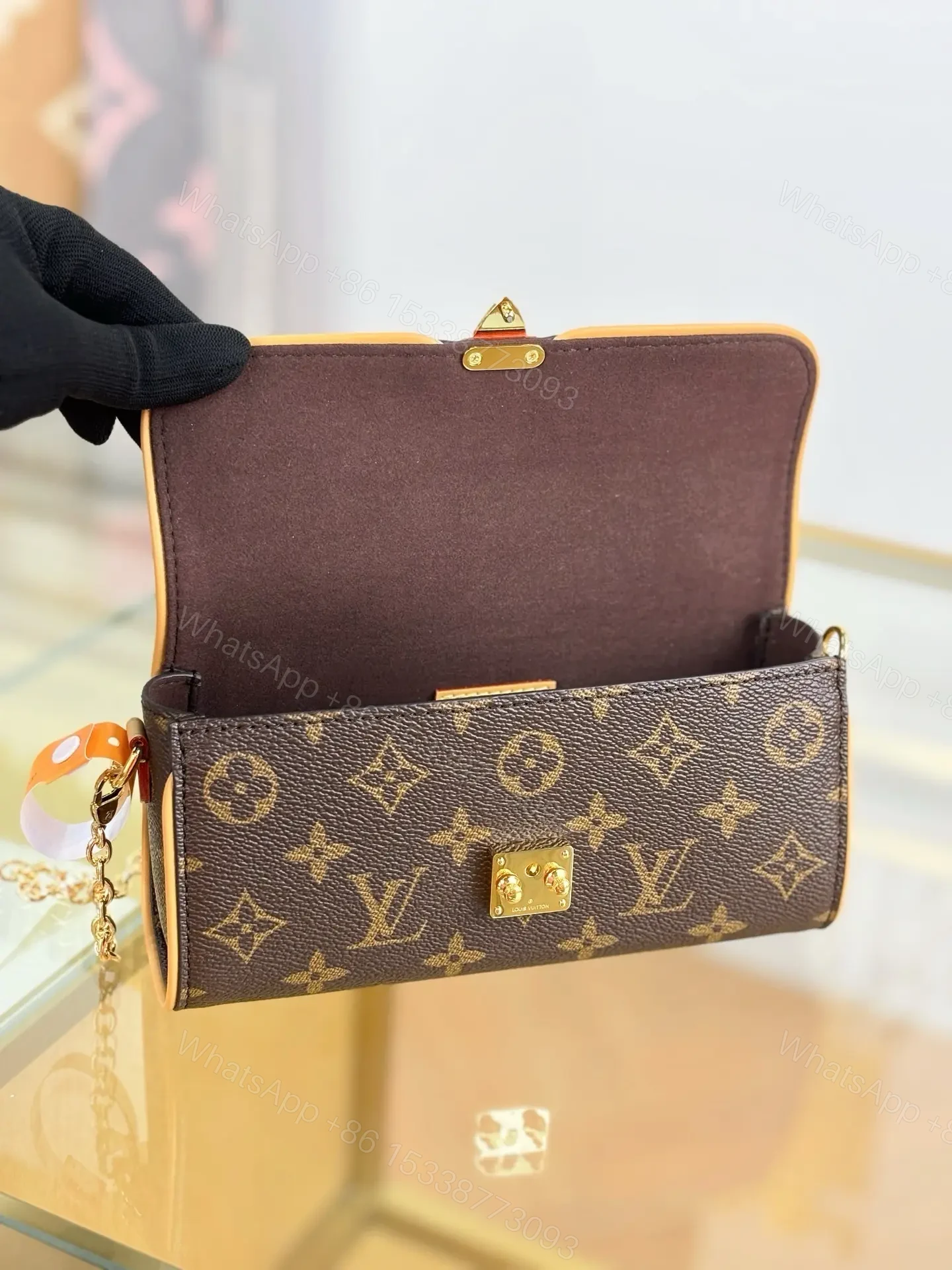 View 3 of Louis Vuitton Monogram Pochette Camille in monogram canvas