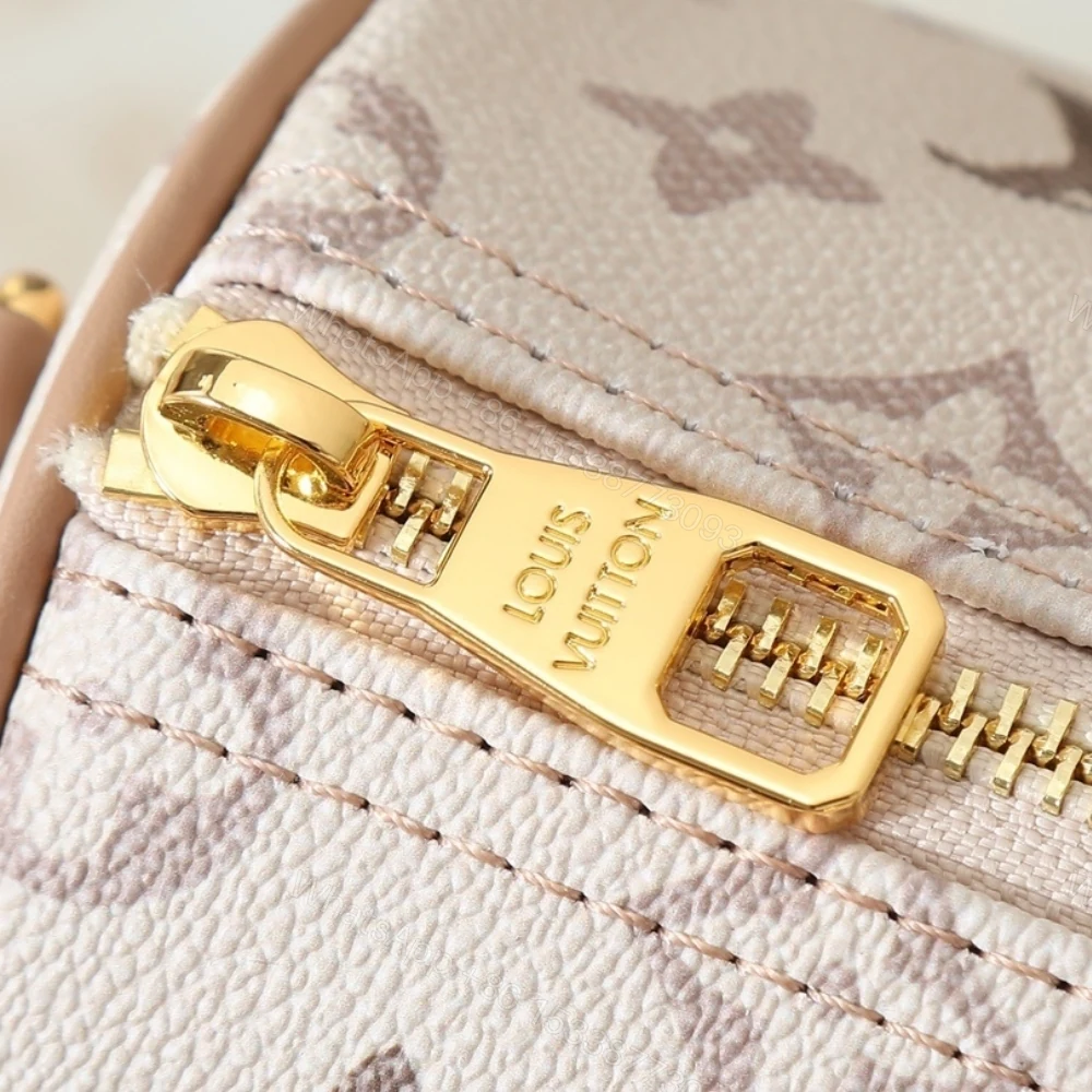 View 8 of Louis Vuitton Keepall Bandoulière 25 Monogram Beige 25Cm