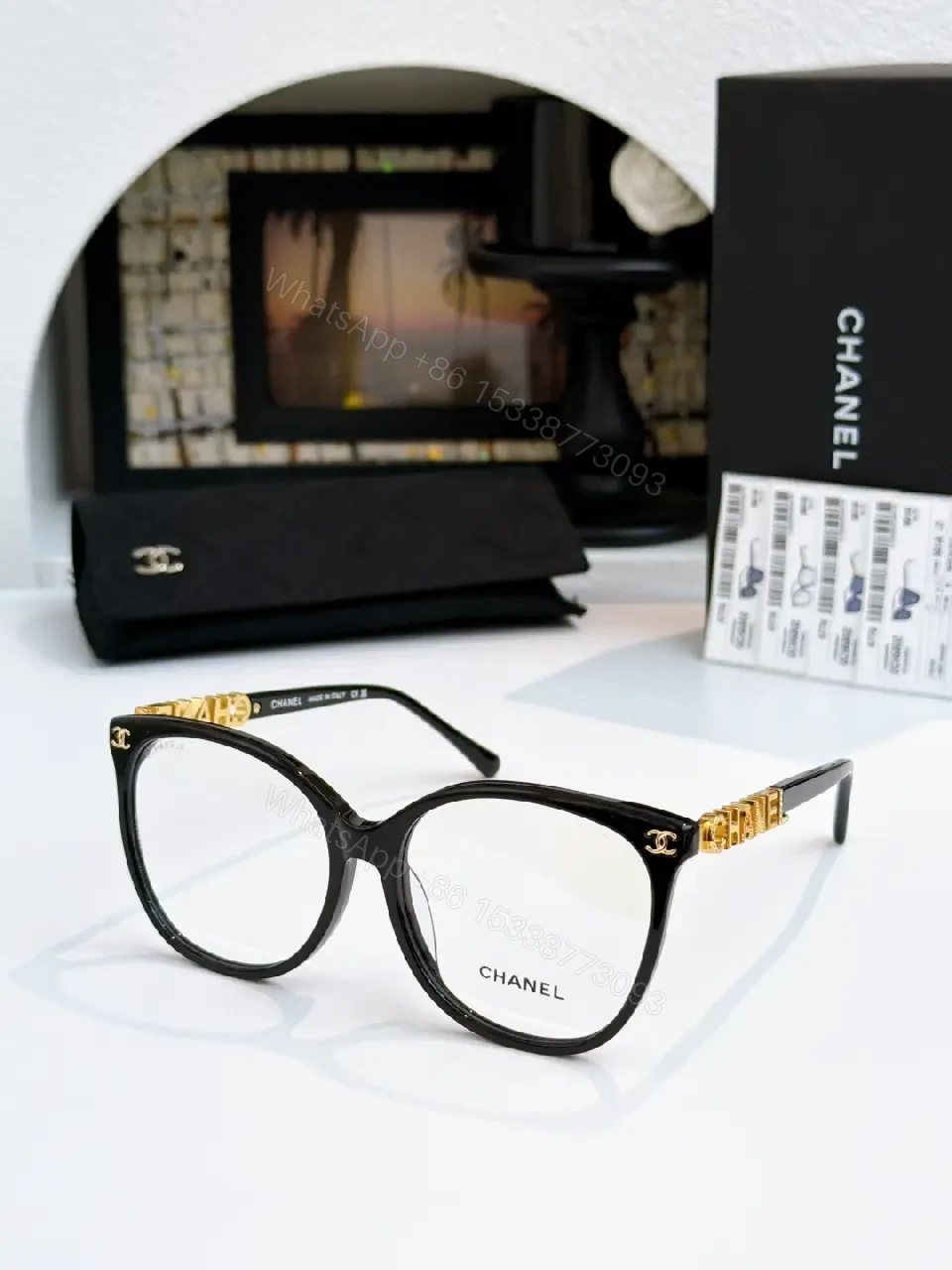 View 3 of Black Thick-Rim Glasses, Square Full-R Rim, Sculpted Bridge, Ribbed Arms, Chanel Detailing