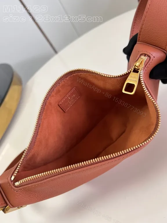 View 7 of Leather Belt Bag: Subtle LV Logo, Crescent Shape, Crossbody Carry