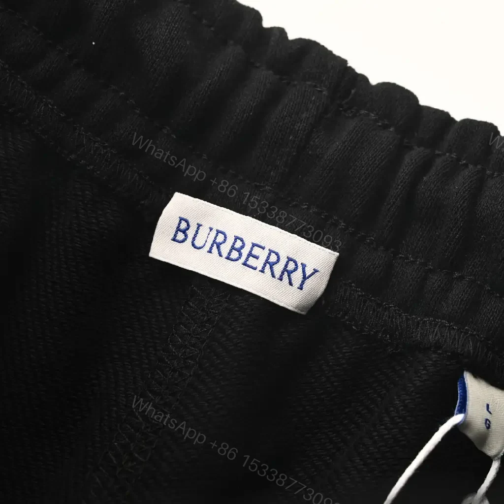 View 2 of Black Nylon Relaxed Shorts with Burberry Patch
