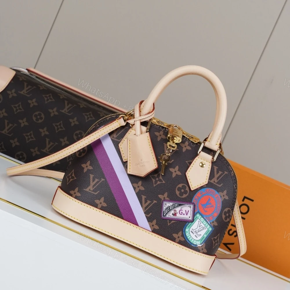View 2 of Louis Vuitton Alma BB Mon Monogram Brown 23Cm