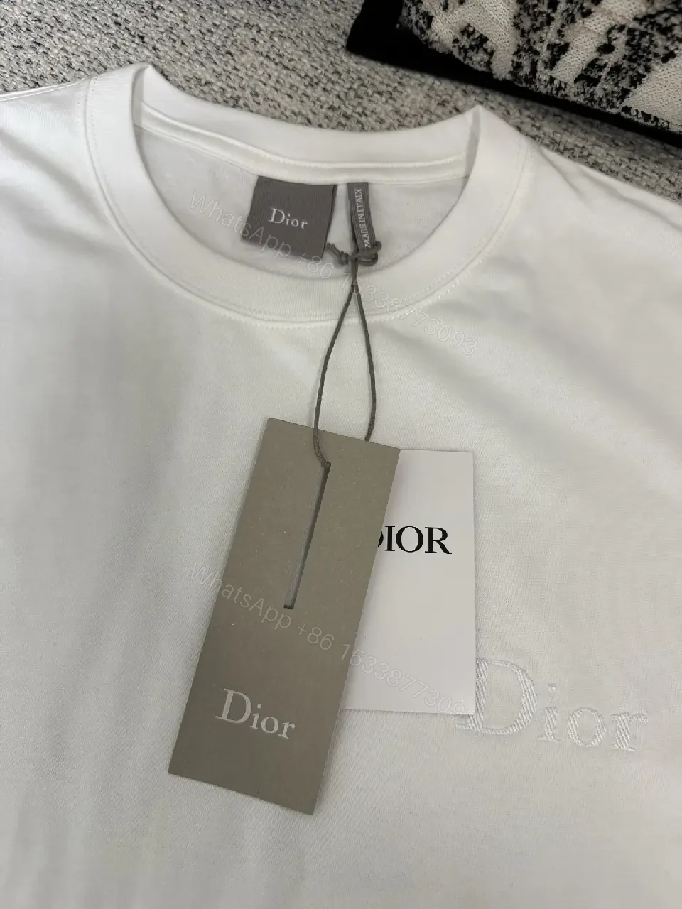 View 6 of Minimalist White Cotton Tee with Subtle Logo