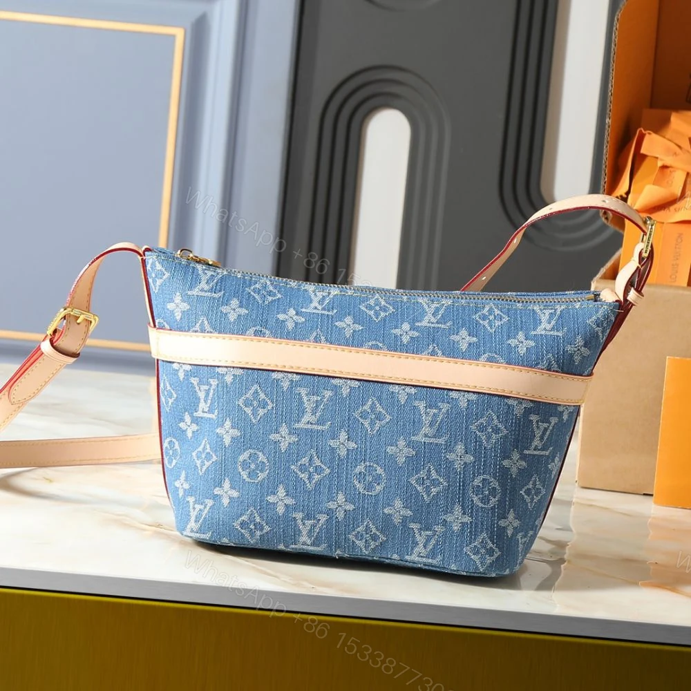 View 2 of Louis Vuitton Cruiser Toiletry Bag Blue Denim 22Cm M27945