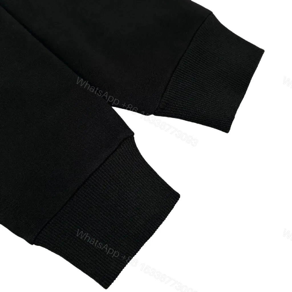 View 7 of Black Logo Hoodie: Subtle Luxe Graphic Comfort