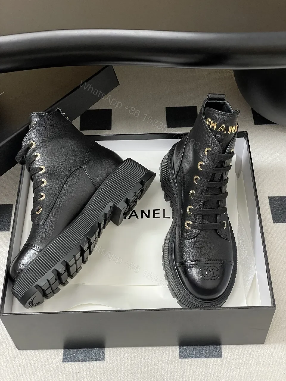 View 4 of Black Leather Combat Boots with Gold Branding Feature