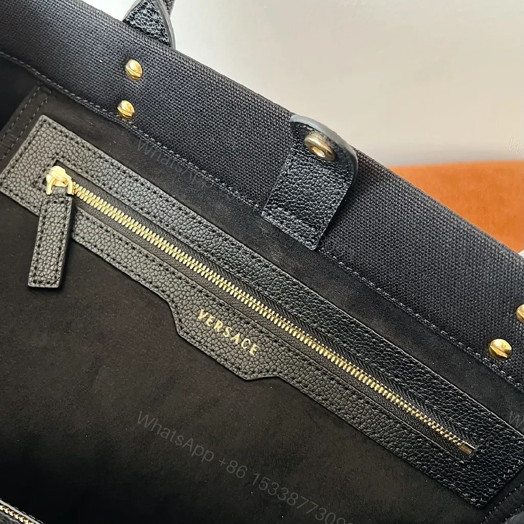 View 5 of Structured Sophistication Tote: Black, Matte Shell, Modern Luxury, Gold Hardware