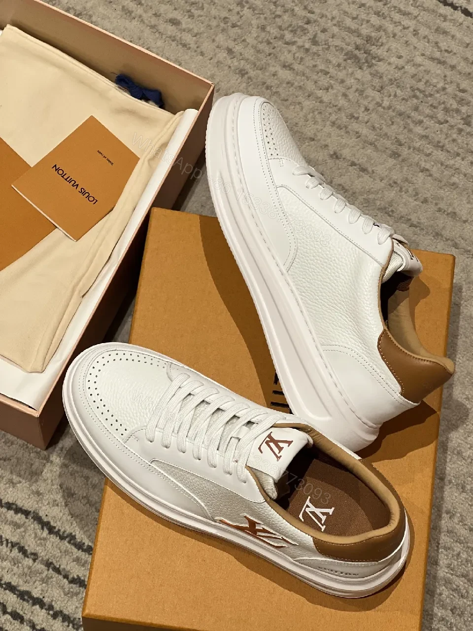 View 5 of White Leather Low-Top Sneakers - Contrasting Tan Accents & LV-Inspired Details