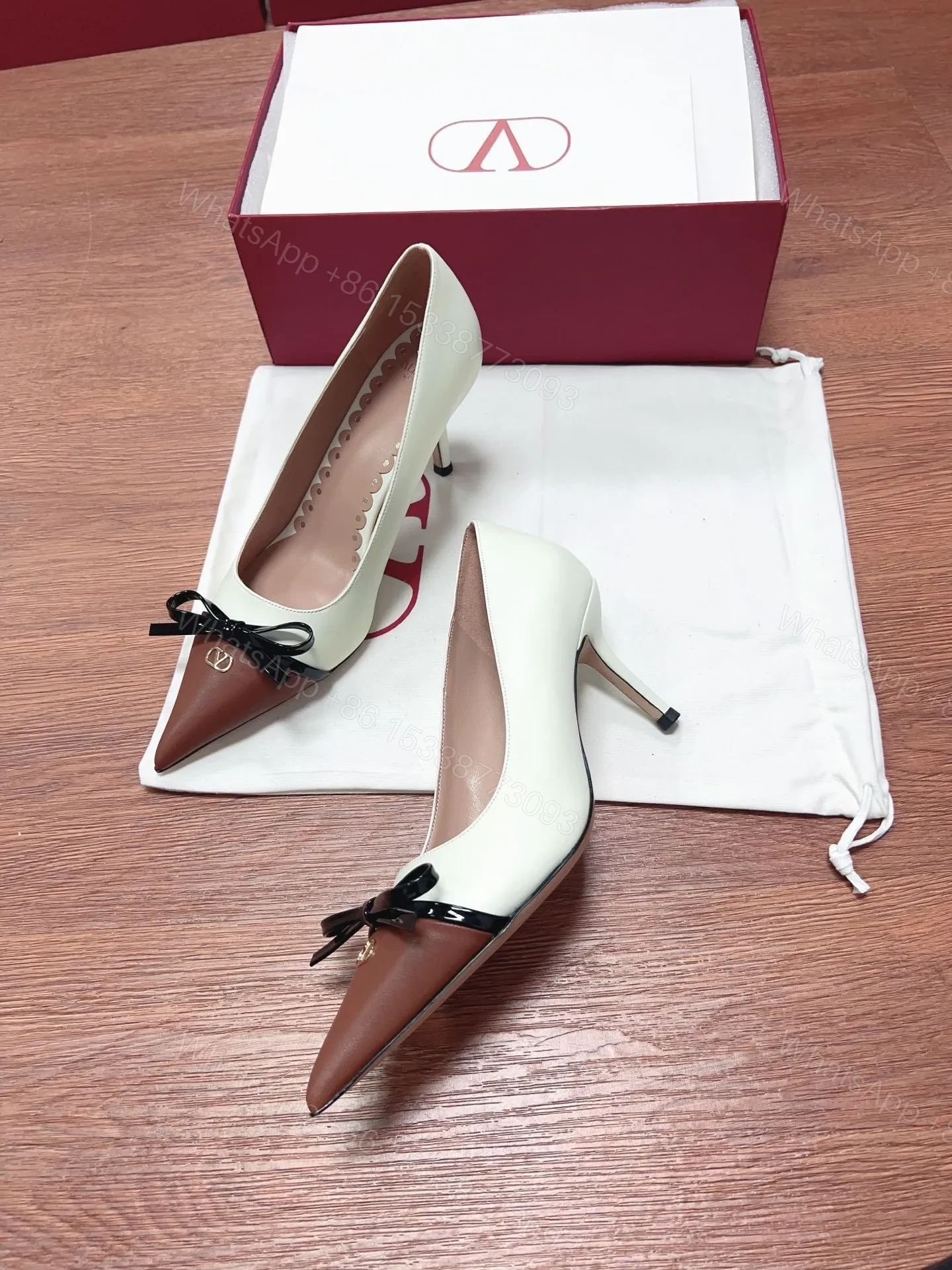 View 2 of Valentino Women White Leather Brown Bow Detail Pumps