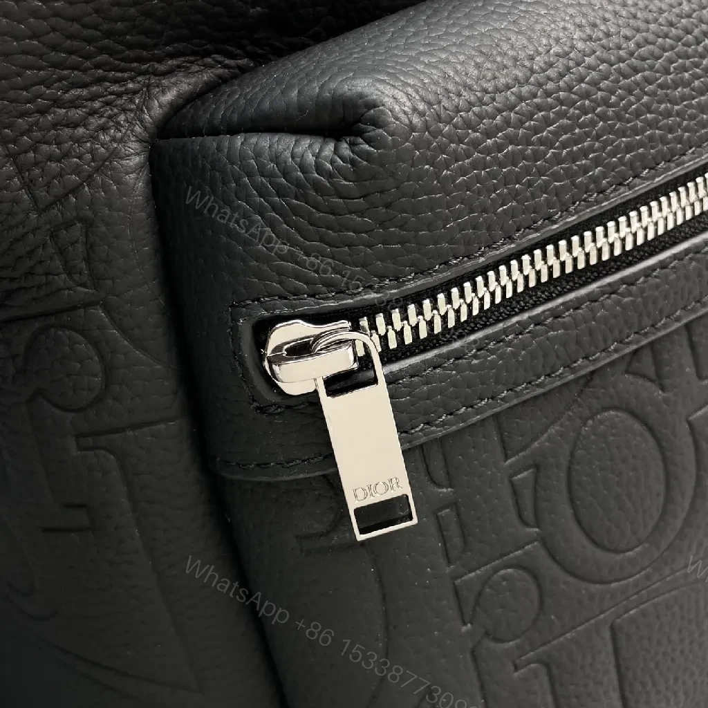 View 6 of Compact Embossed Leather Backpack: Subtle Luxury, Everyday Utility