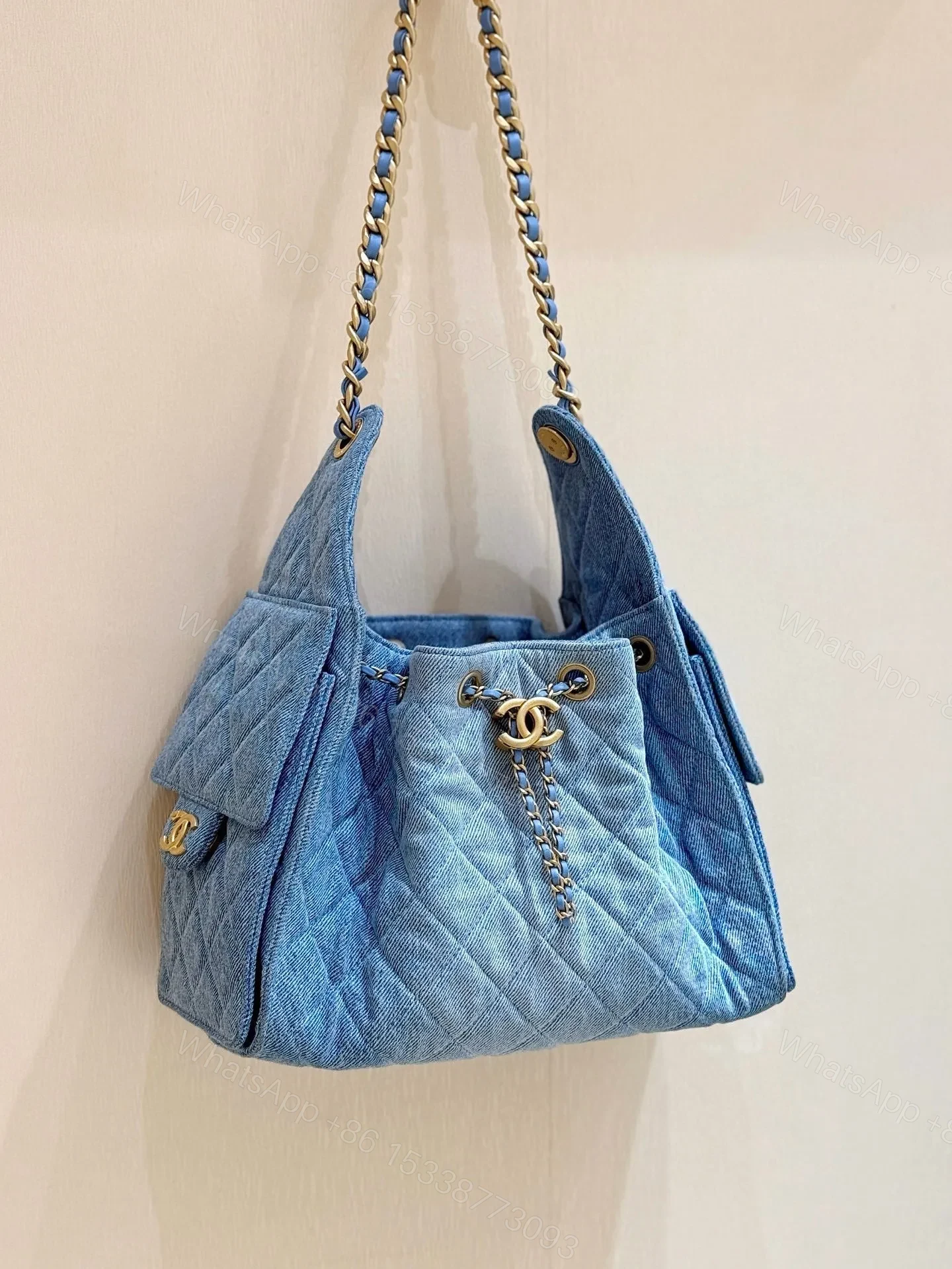 View 4 of CHANEL 25 SMALL IN BLUE 30 DENIM GOLD HARDWARE