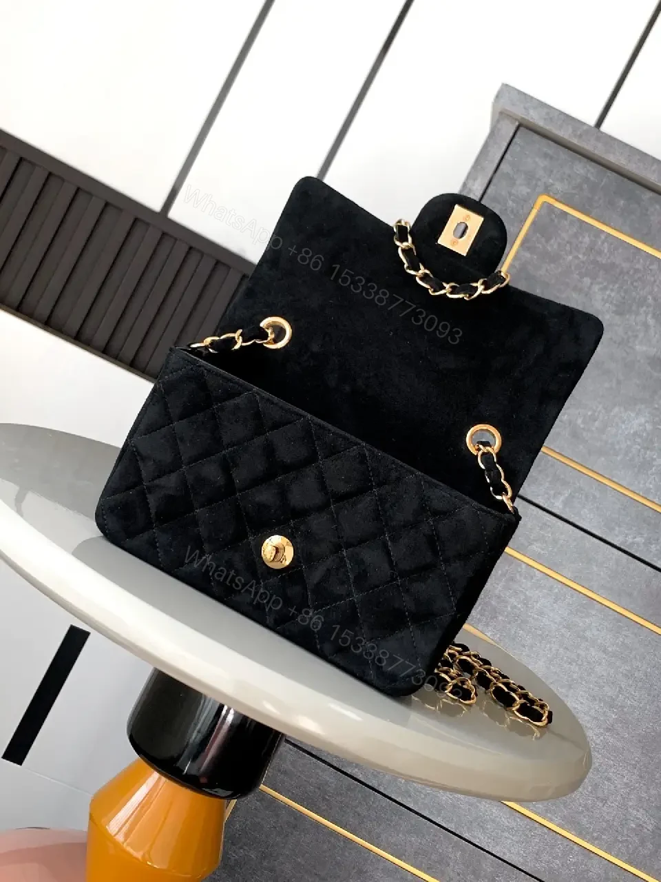 View 5 of Quilted Black Shoulder Bag with Gold Hardware - Chic Luxury Style