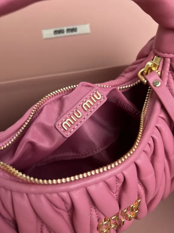 View 5 of Pink Quilted Miu Miu Mini Bag â€“ Luxury Everyday Chic