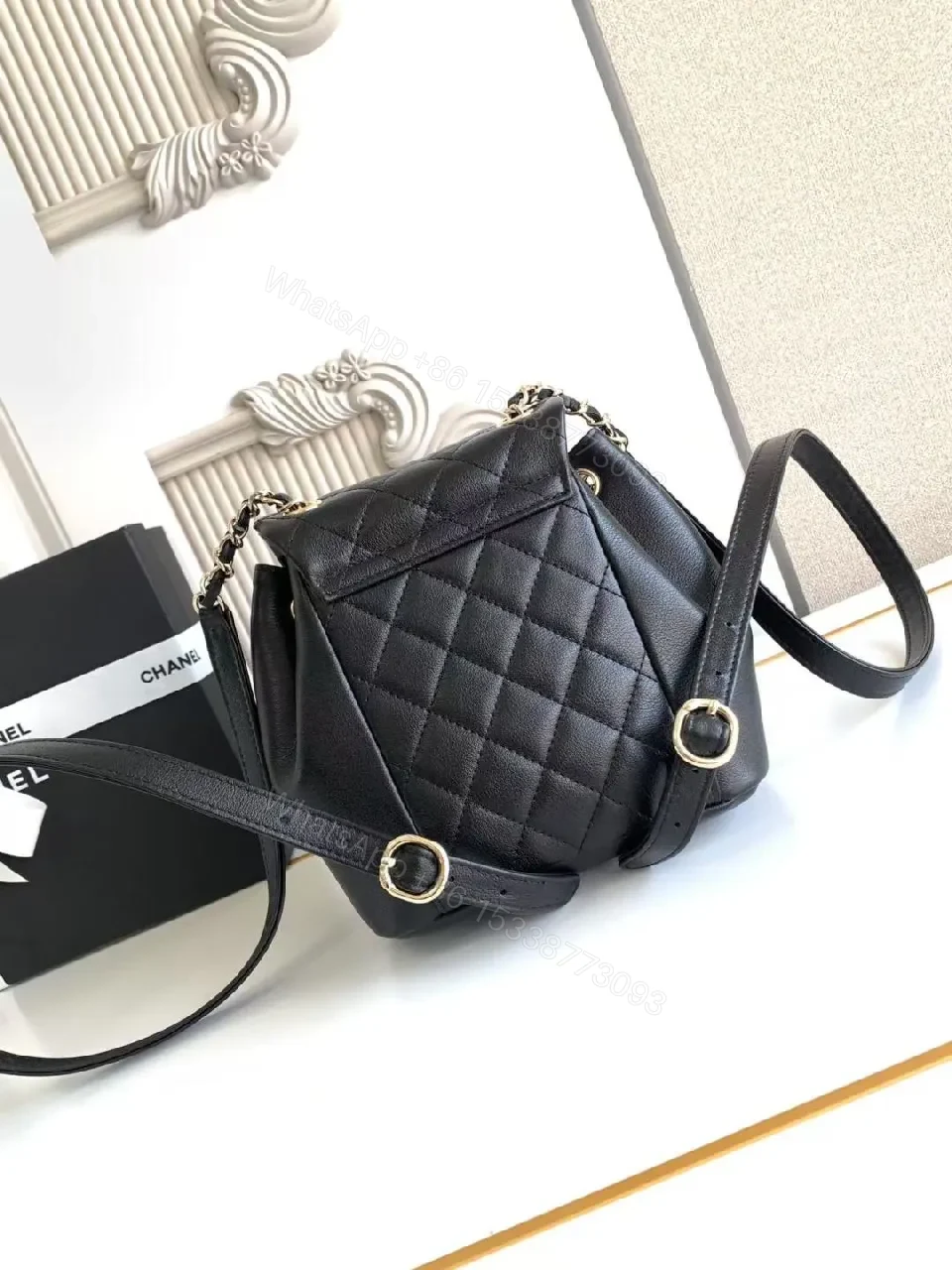 View 5 of Quilted Black Backpack with Gold Hardware Luxury Mini Bag