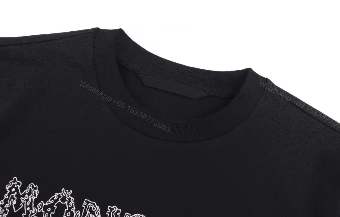 View 9 of Minimalist Black Tee, Premium Cotton, Modern Fit, Logo Detail, T-Shirt