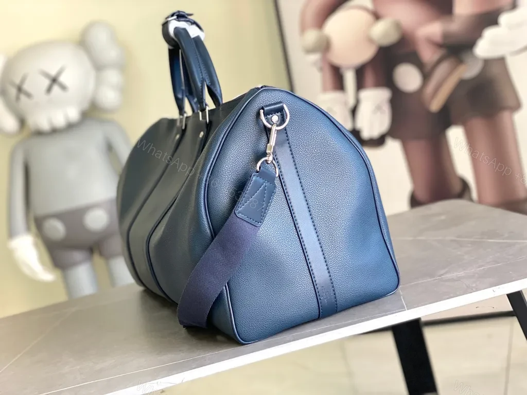 View 5 of Bold Blue Duffle Bag: Pebble Leather-Inspired Luxury Carryall