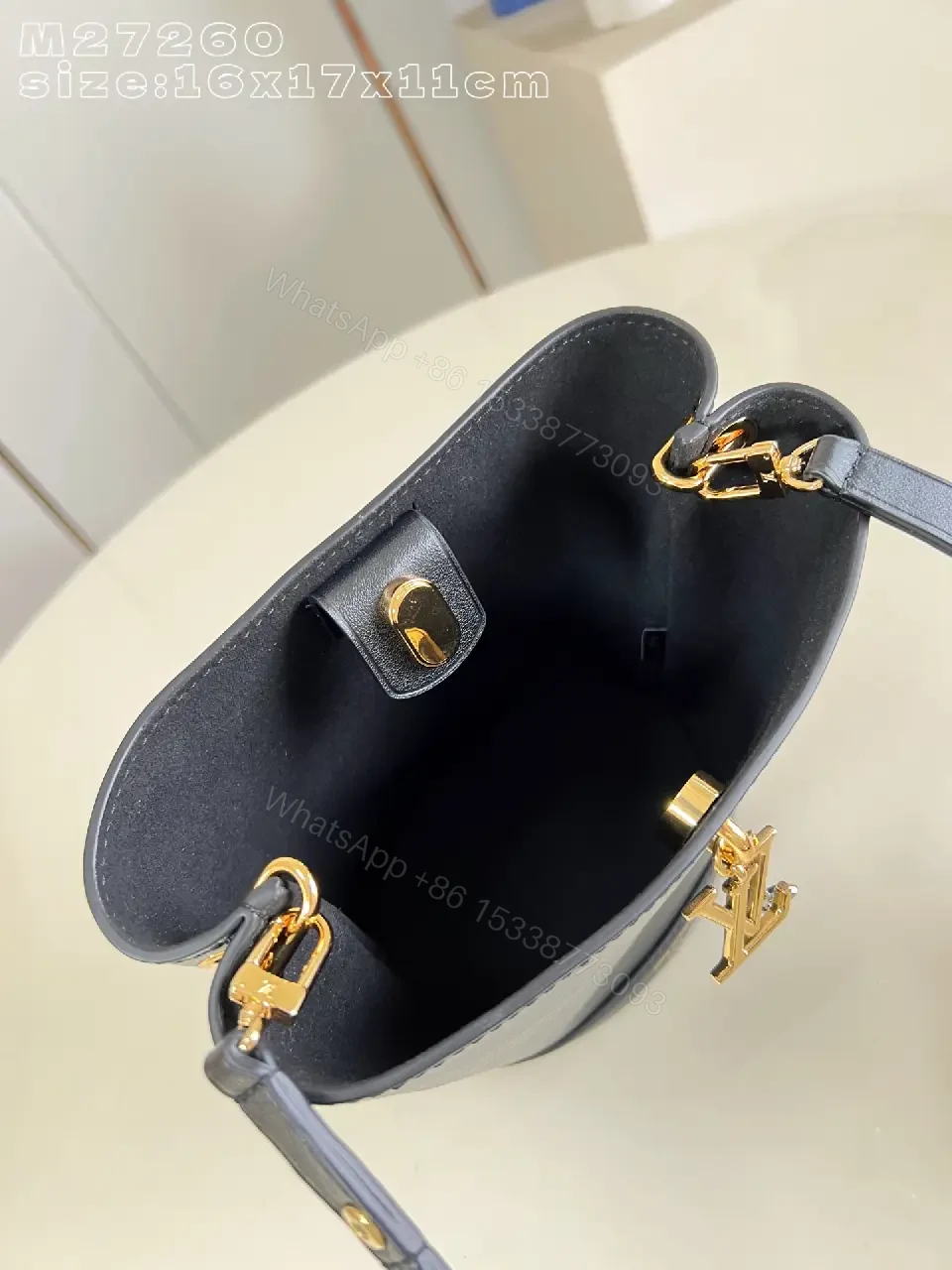 View 4 of Compact Leather Bucket Bag: Subtle Luxury, Everyday Chic