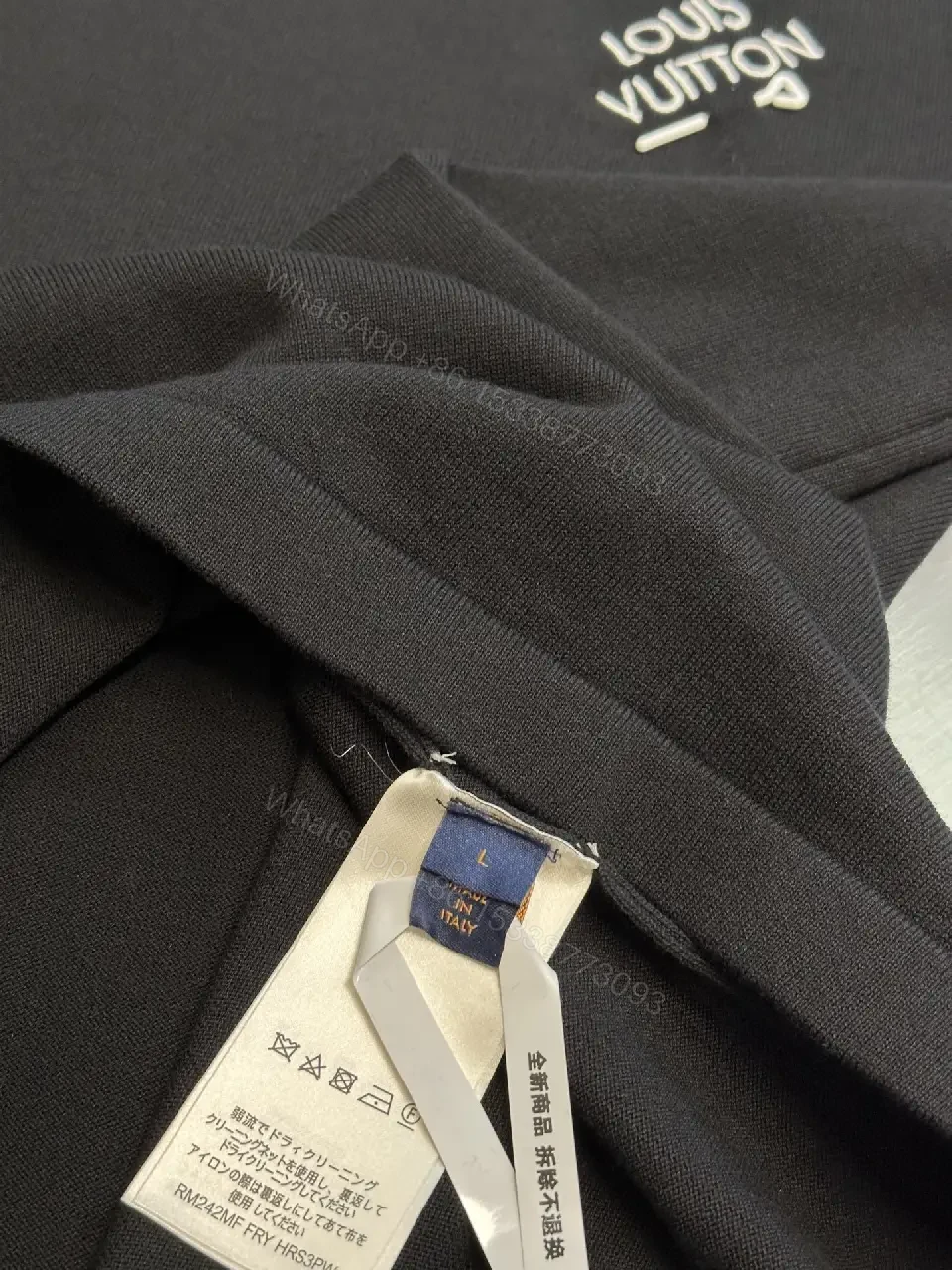View 10 of Minimalist Black Crewneck Tee Dress – Subtle Logo, Versatile Dress