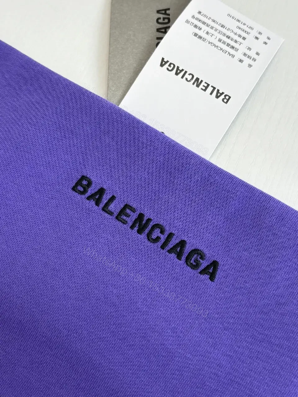 View 2 of Oversized Purple Logo Tee — Luxury Casual, Minimal Branding