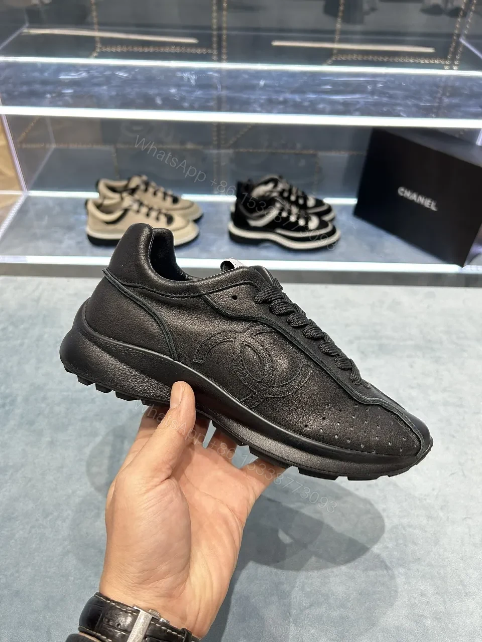 View 7 of Black Leather-Trim Sneaker with Perforations + Luxe Casual Sneakers
