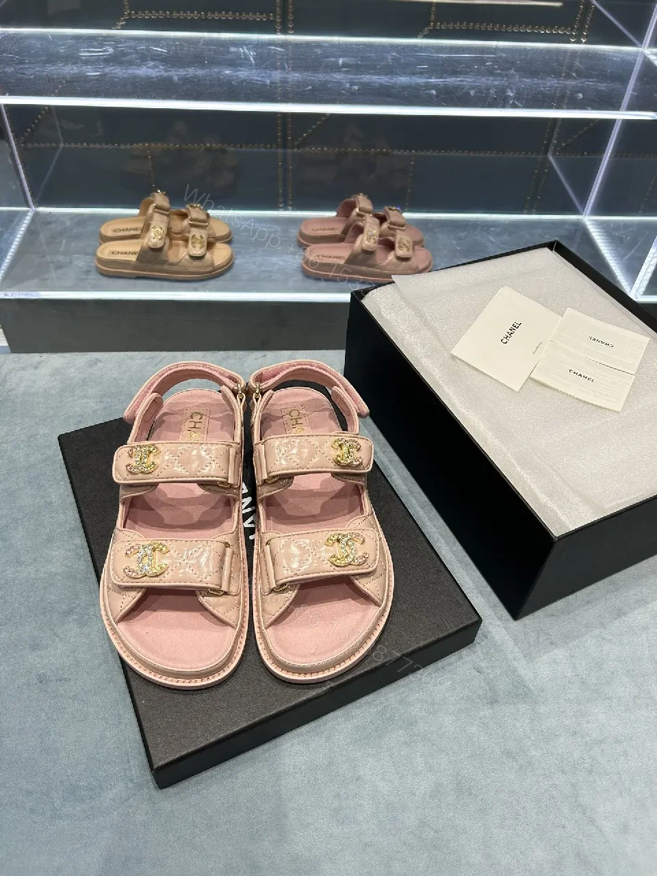 View 3 of Soft Pink Quilted Sandals with Gold Emblem Embellishment
