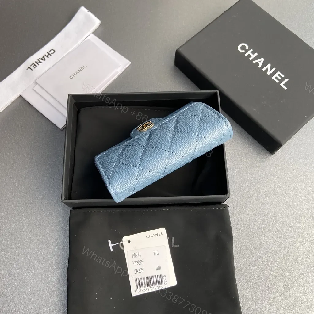 View 2 of Powder Blue Quilted Lambskin Wallet: Compact, Day-to-Night Chic