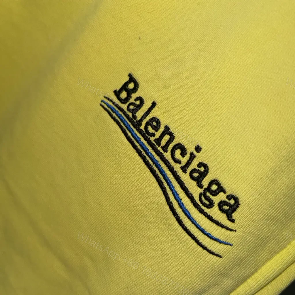 View 3 of Neon Yellow Nylon Swim Shorts with Drawstring Balenciaga Logo