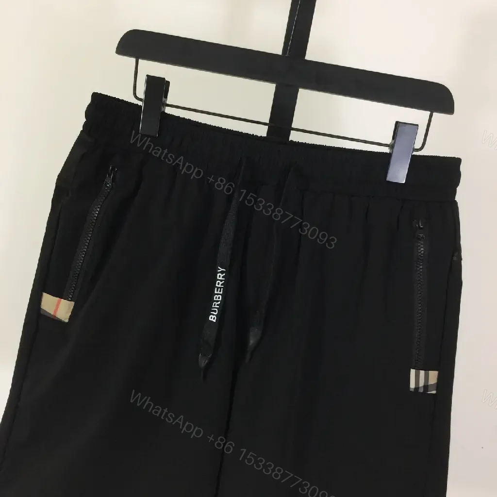 View 4 of Black Nylon Shorts with Burberry Stripes Drawcord Opening