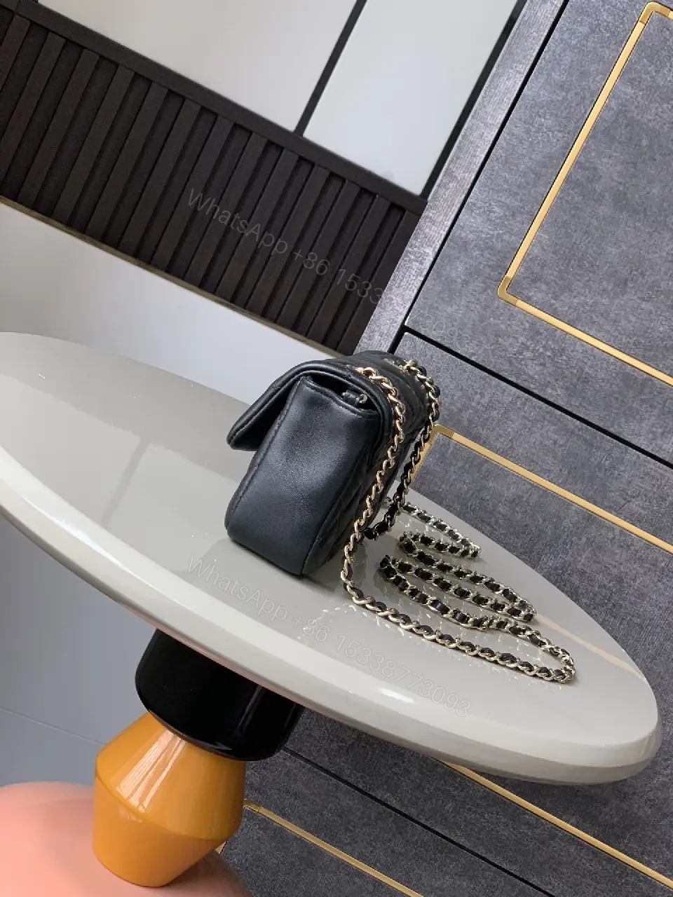 View 9 of Compact Quilted Leather Crossbody with Gold Logo Crossbody Bag